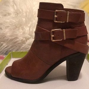 Gianni bini tannir belted peep booties.